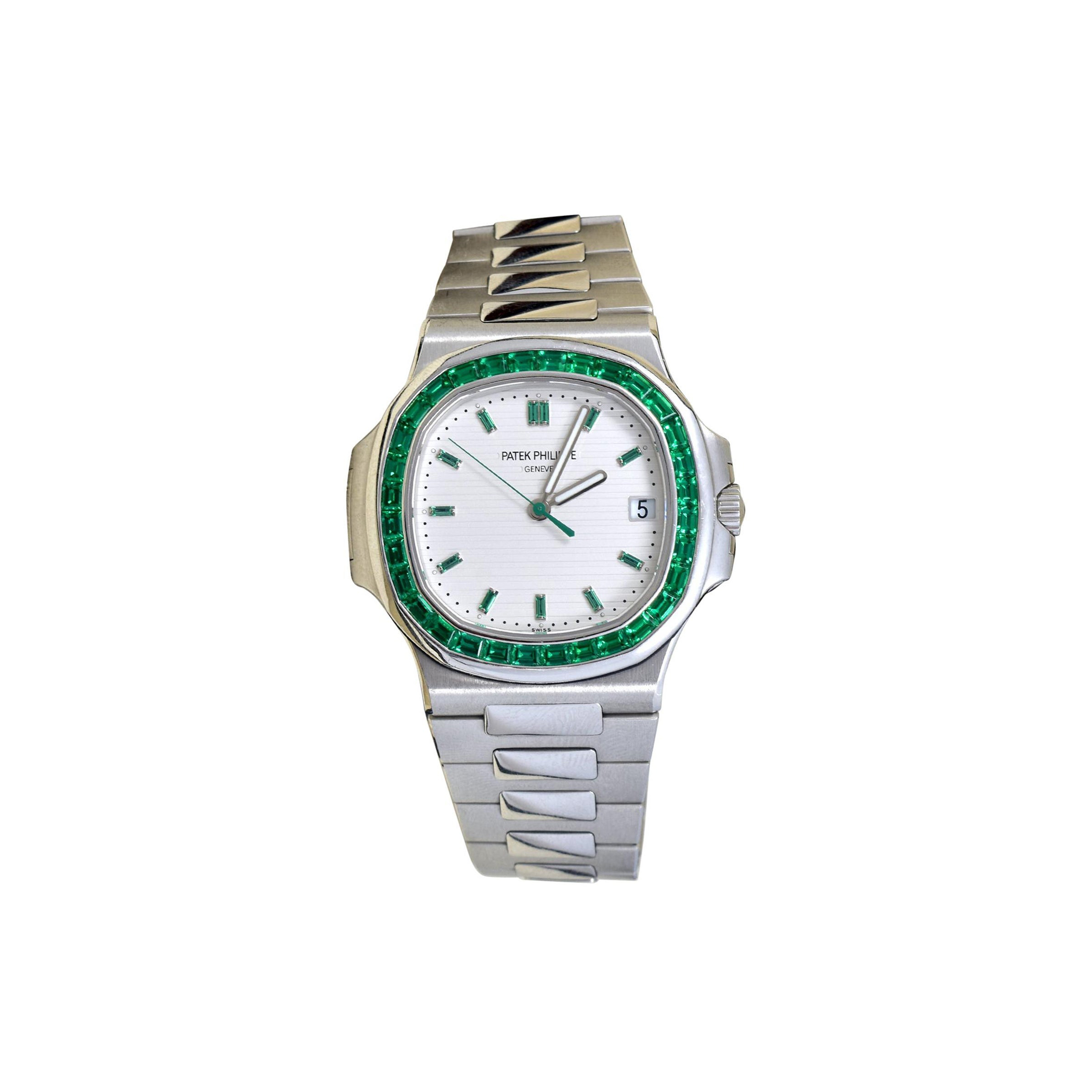 PATEK PHILIPPE EMERALD NAUTILUS WATCH 5711P